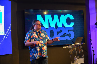Speaker presenting at NWC 2025.